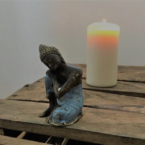Budda mit Kerze